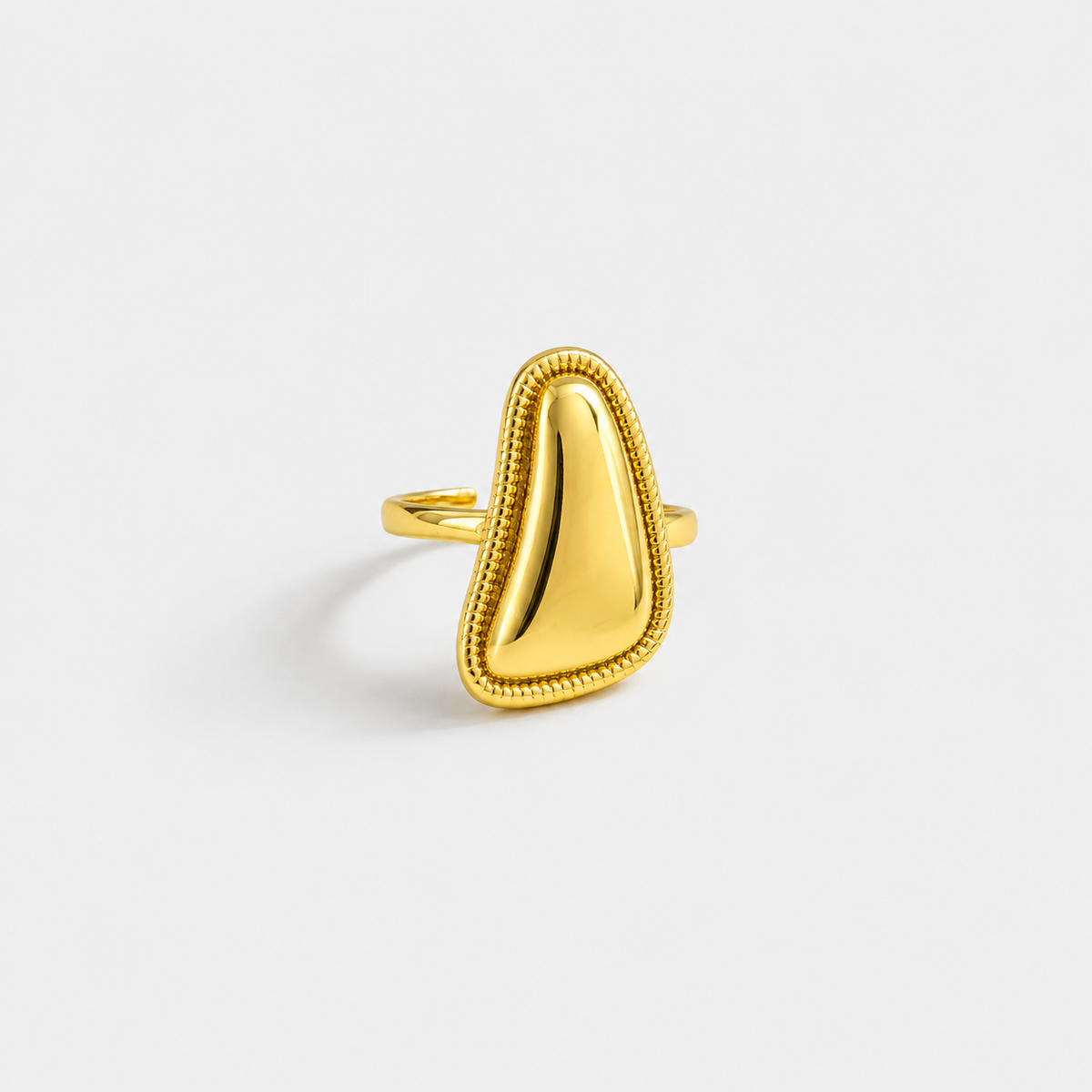 Triangular gold ring